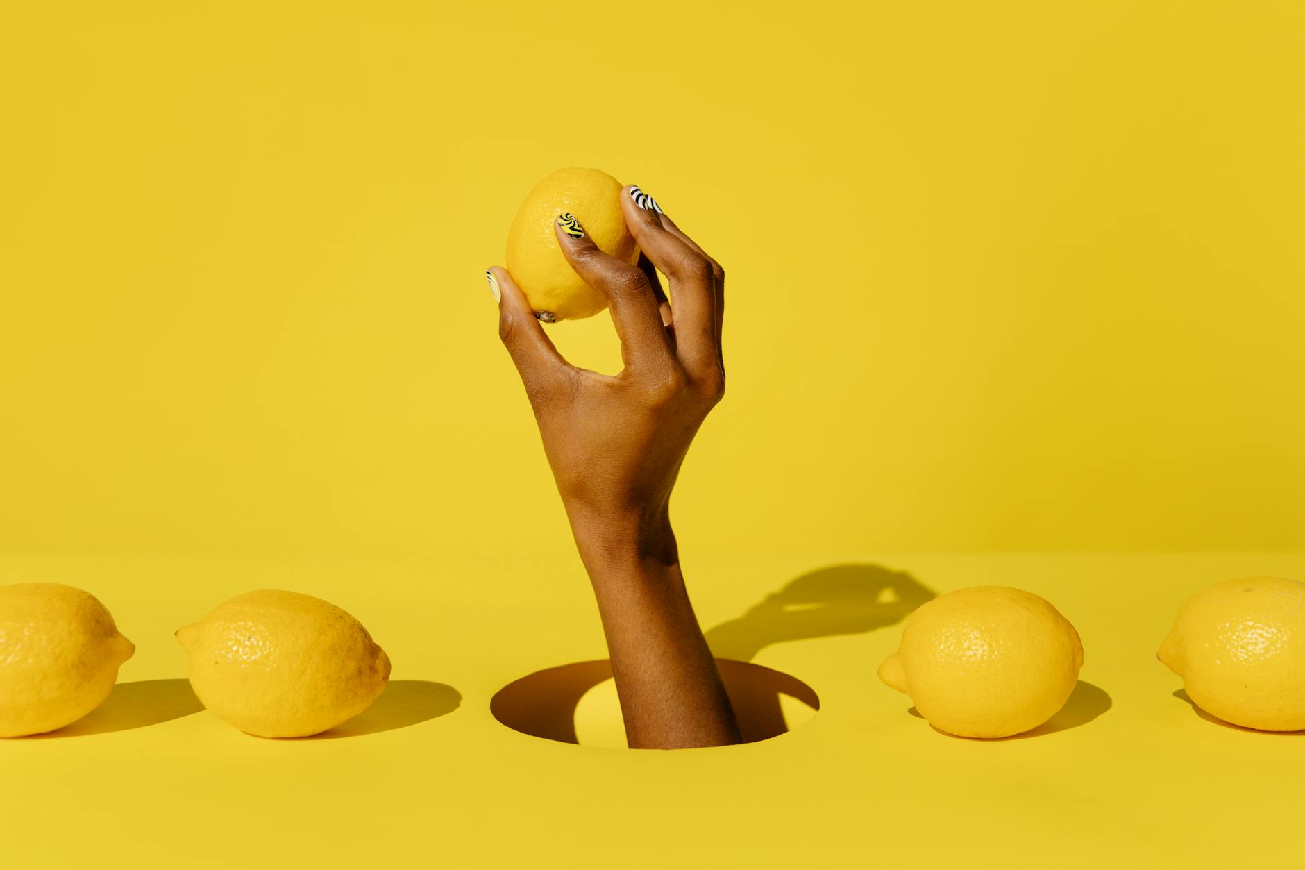 Hands holding a blue personal massager, representing shared pleasure and intimacy